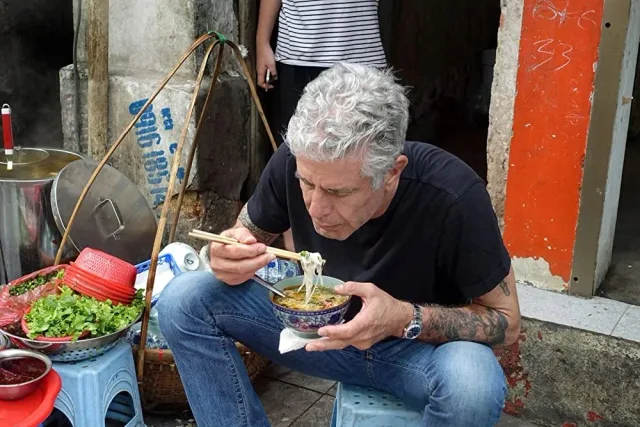 Street-side noodle soup at a Hanoi Old Quarter food stall